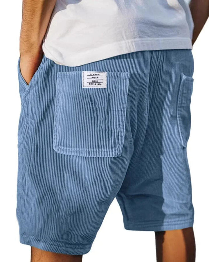 Shorts uomo estivi in tessuto a coste, offrono comfort casual e una vestibilità rilassata per l'estate.