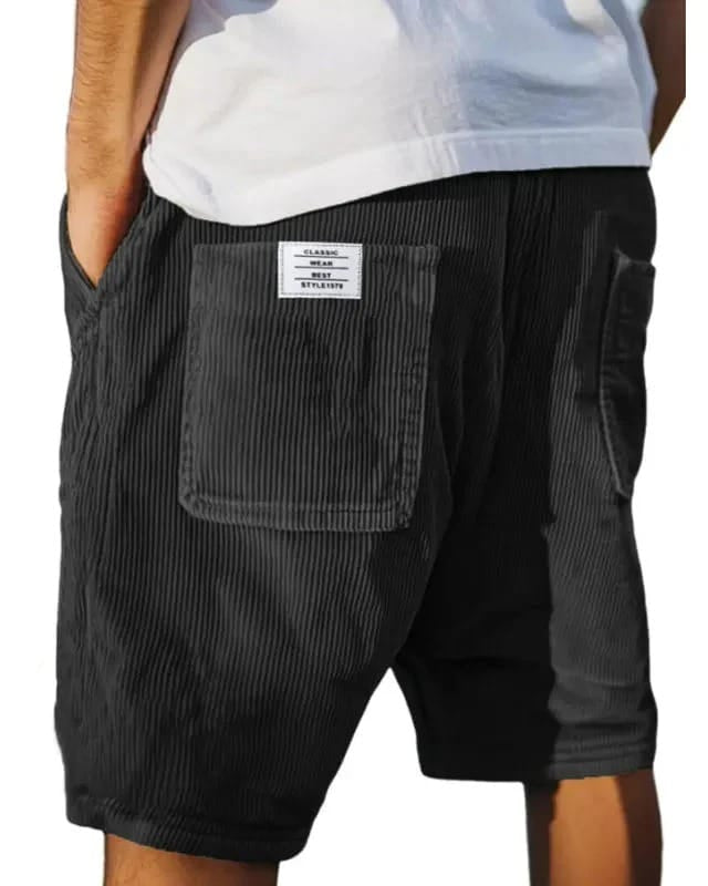 Pantaloncini uomo con cintura elastica e tasche, design a coste, per un look estivo casual e comodo.