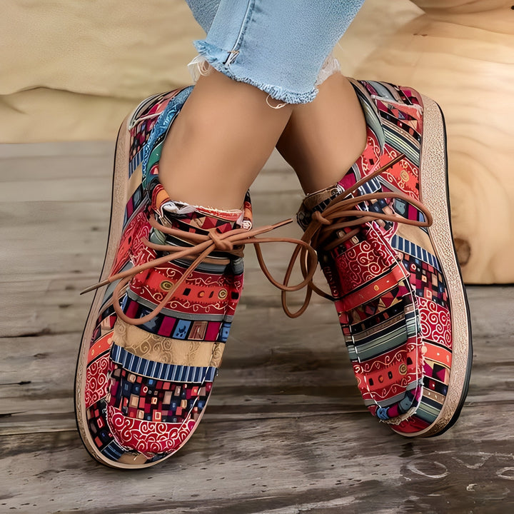 Moderne sneakers donna ammortizzate per massimo comfort. Ideali per passeggio, stile artistico e uso quotidiano.