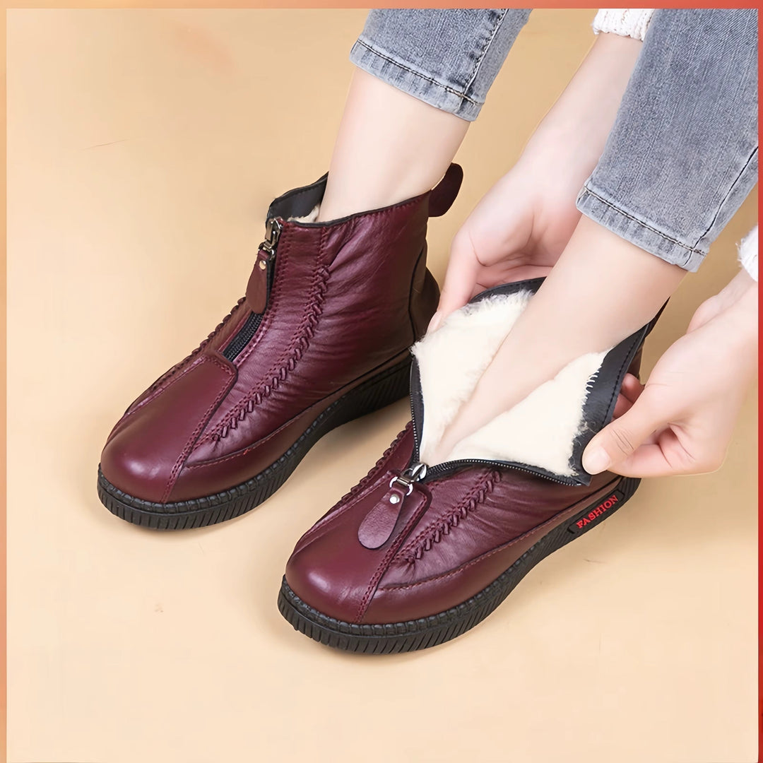 Stivali eleganti neri per donna, ideali per affrontare l'inverno con stile.