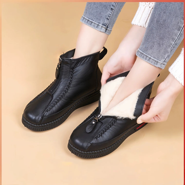 Moda inverno: stivali neri eleganti, un must-have per la donna moderna.