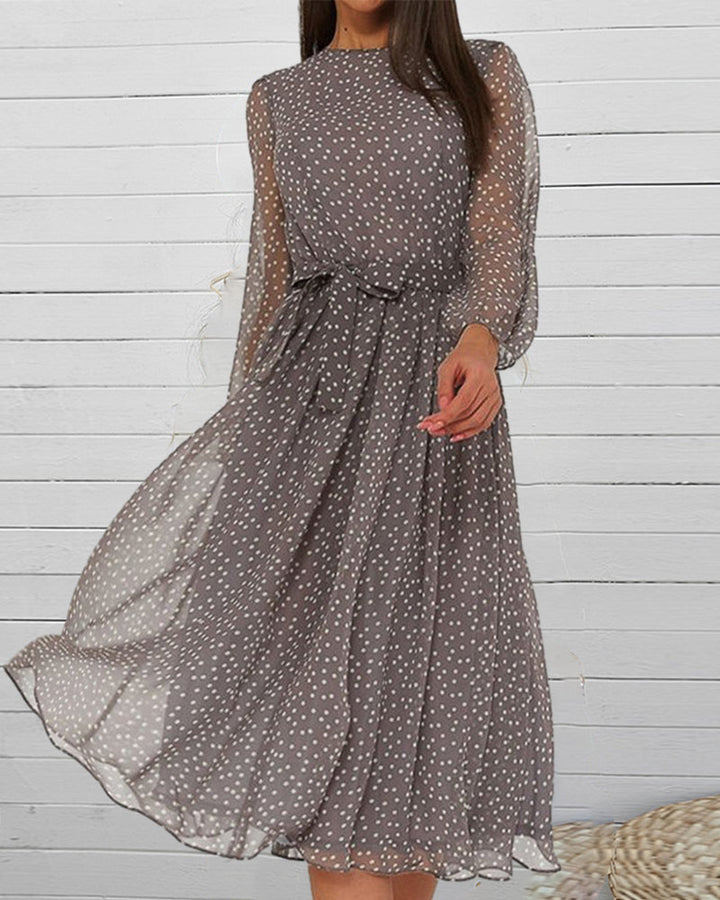 Vestito donna grigio a pois, linea A, lunghezza al ginocchio. Ideale per comfort quotidiano ed eleganza versatile.