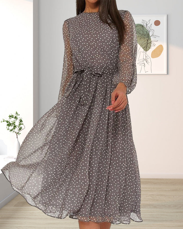 Abito donna grigio a pois, taglio a linea A e maniche lunghe. Eleganza versatile per la moda femminile.