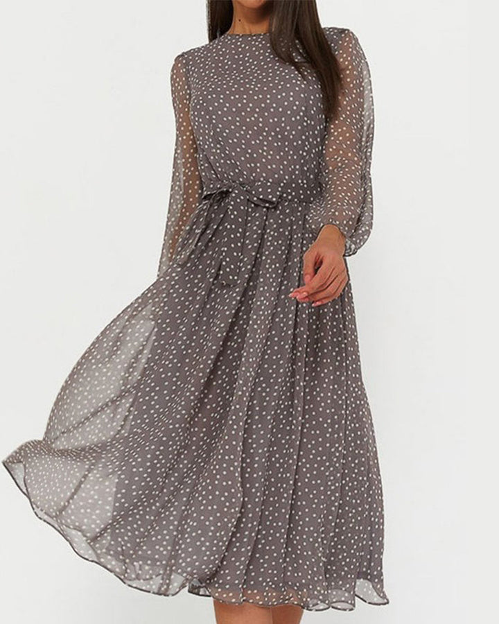 Abito donna grigio a pois, linea A, maniche lunghe. Perfetto per outfit ufficio o casual elegante.