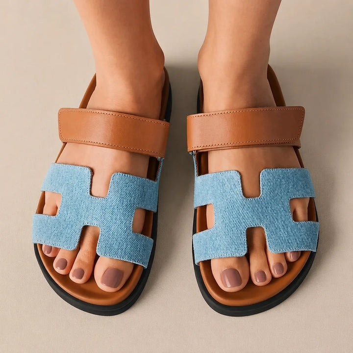 Sandali unisex Saint-Tropez, essenziali per la moda mare, comodi ed eleganti.