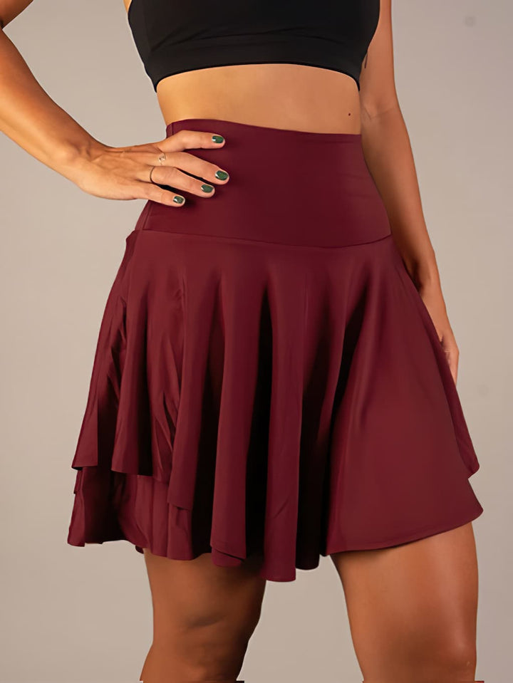 Skort da allenamento donna, ultra leggera e traspirante, per performance ottimali nel tennis.