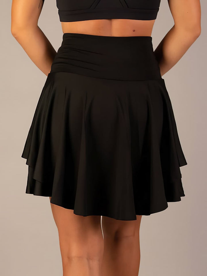 Gonna da tennis donna leggera e traspirante, offre supporto e freschezza sul campo da gioco.