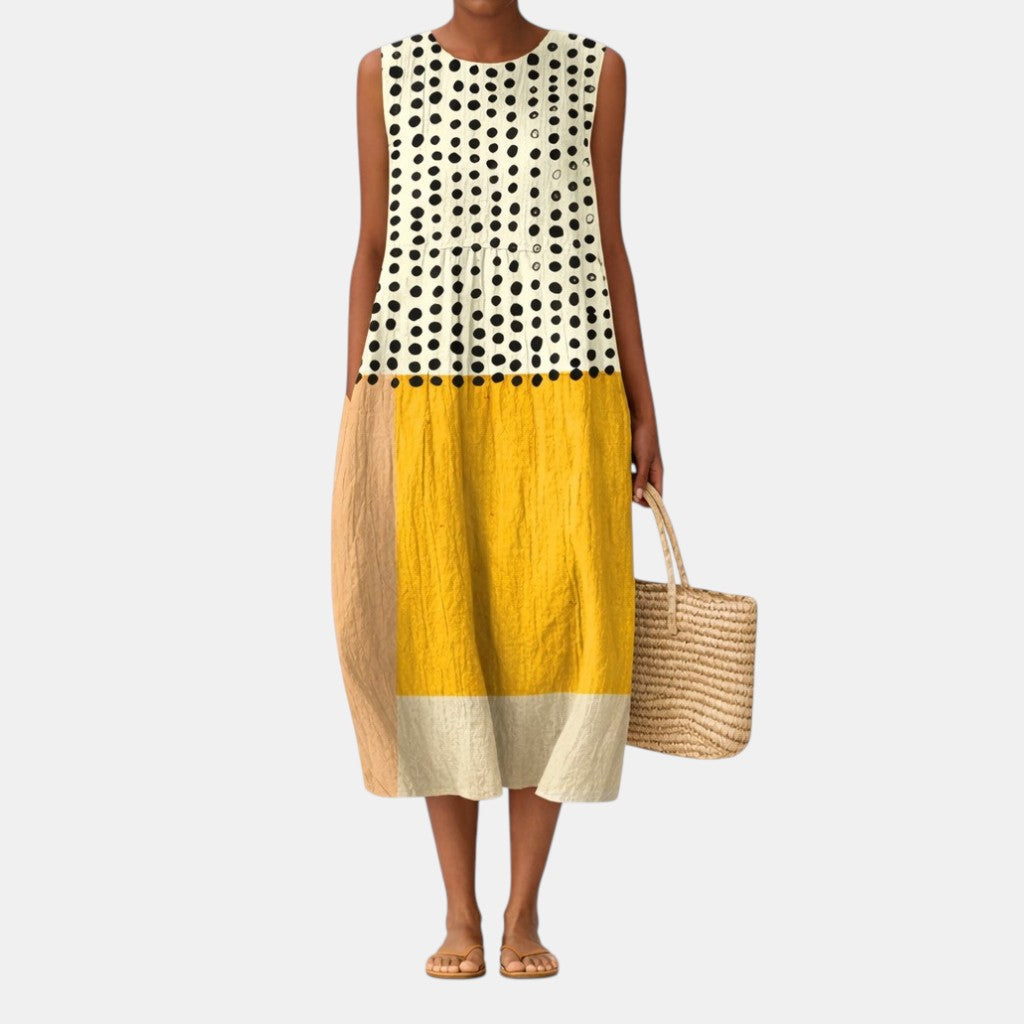 Abito midi casual donna con motivo a pois e design color block, realizzato in morbido cotone viscosa per primavera.