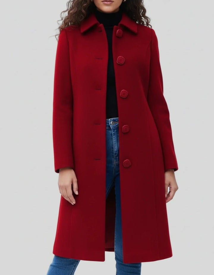 Elegante trench invernale femminile, monopetto e lungo, un capo essenziale per il tuo guardaroba freddo.