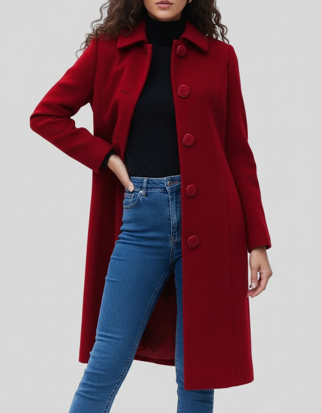 Trench donna invernale, taglio lungo e monopetto, moda femminile per stile e calore avvolgente.