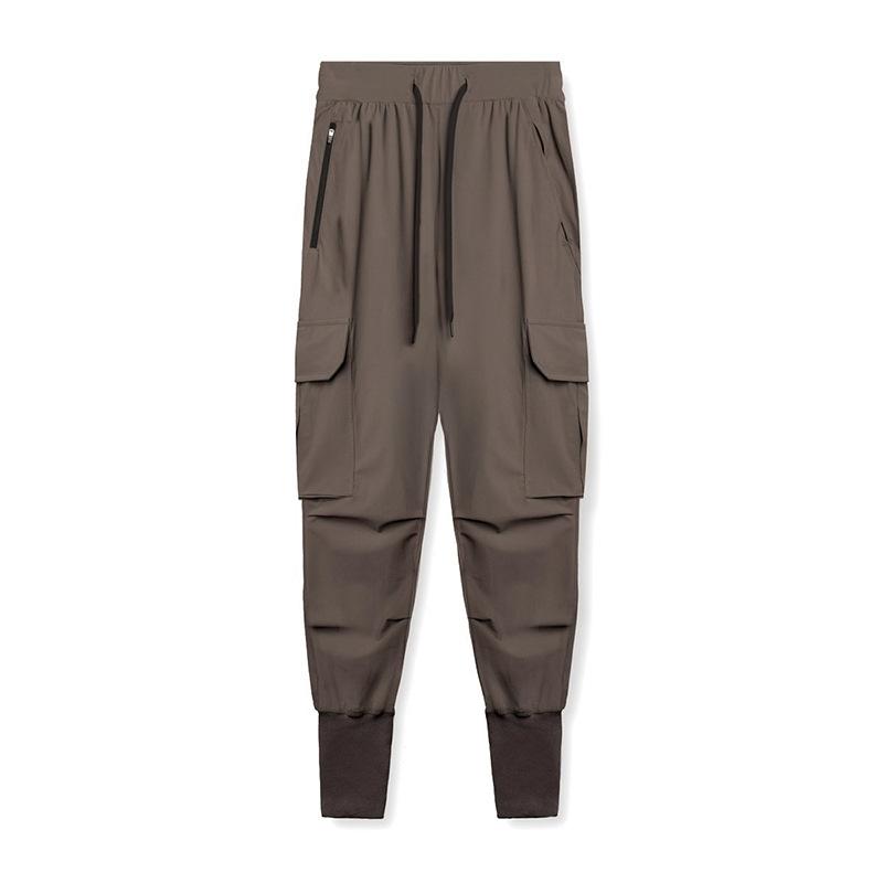 Pantaloni sportivi uomo con tasche, design jogger per massimo comfort e versatilità.