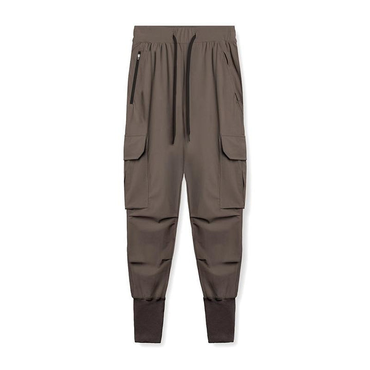 Pantaloni sportivi uomo con tasche, design jogger per massimo comfort e versatilità.