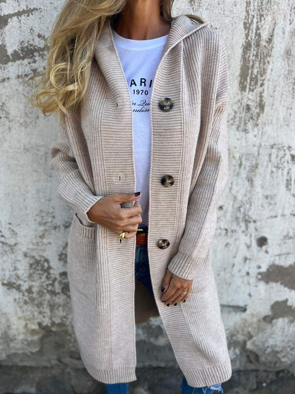 Cardigan lungo elegante da donna in maglia, perfetto per uno stile sofisticato e confortevole in ogni occasione.