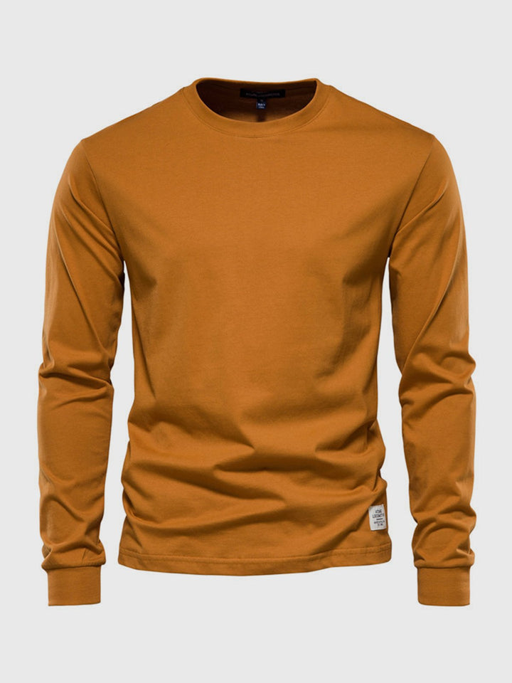 T-shirt uomo, maniche lunghe, girocollo, design semplice ed elegante per un look casual e moderno.