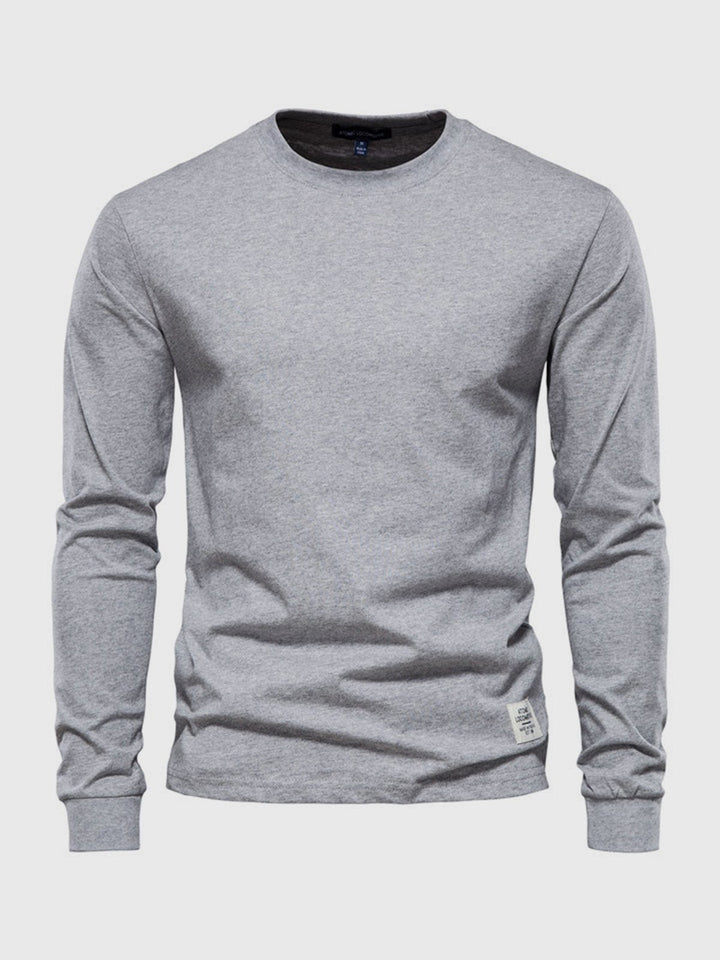 Essenziale t-shirt uomo a maniche lunghe con girocollo, vestibilità regolare, per il massimo comfort.
