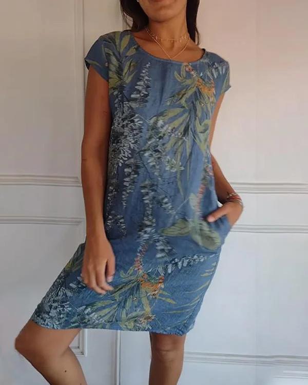 Comodo abito da donna con scollo a V, tasche e design estivo, perfetto per le giornate calde.