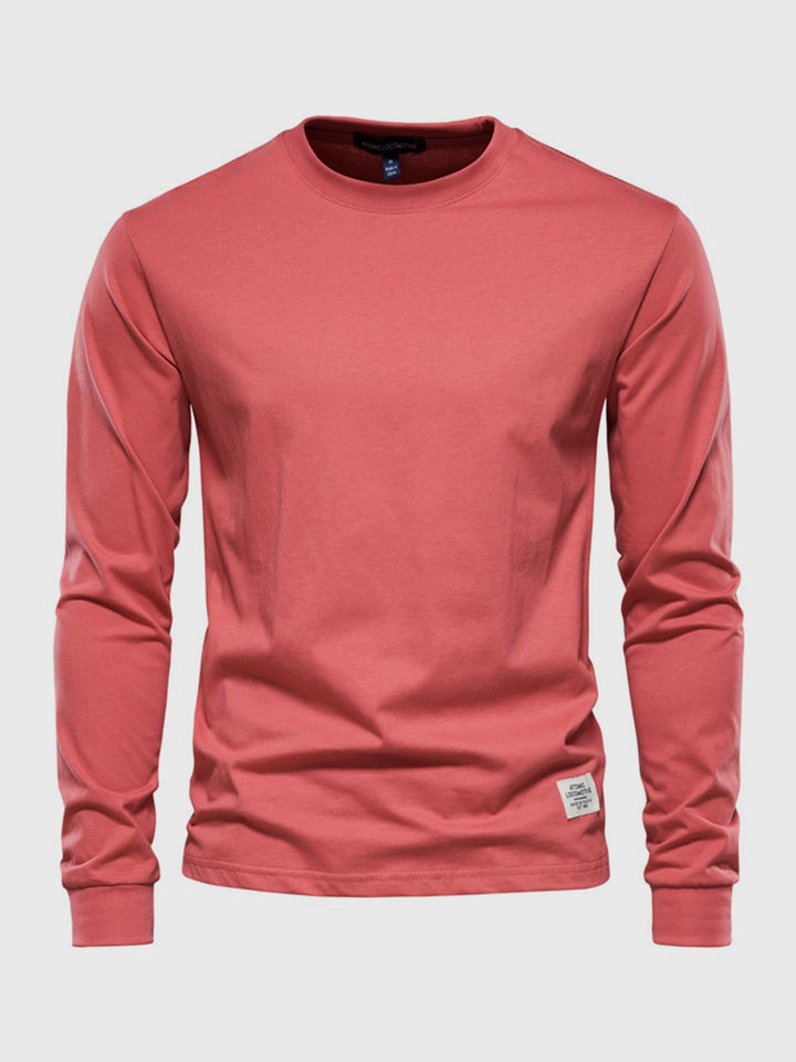 T-shirt uomo casual con girocollo e maniche lunghe, perfetta per un look rilassato e alla moda.