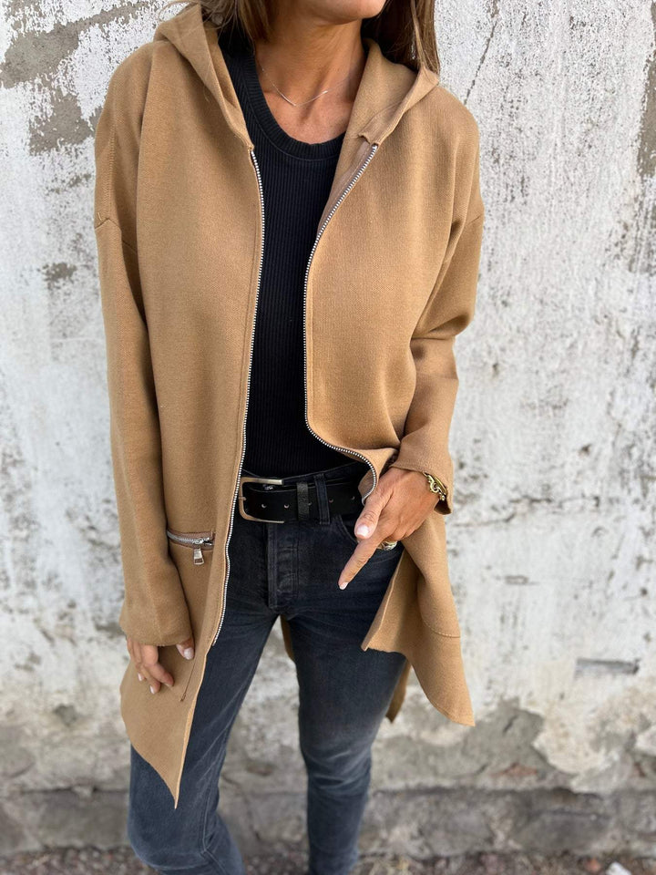 Cardigan lungo da donna alla moda con zip e cappuccio, ideale per outfit casual/eleganti.