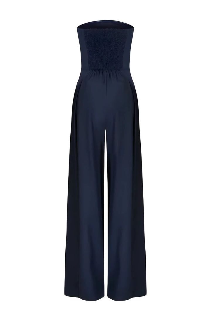 Tuta estiva larga color crema, senza spalline, comoda e alla moda per outfit casual di giorno.