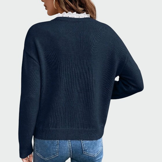Maglione donna casual chic a maniche lunghe con scollo a V e inserti in pizzo, ideale per comfort autunno-inverno.