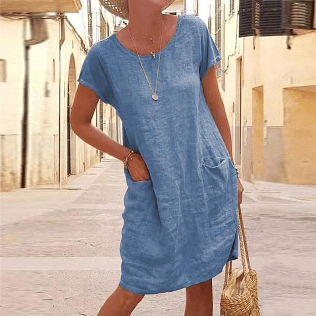 Vestito midi donna casual con maniche corte e tasche, ideale per l'estate, la moda mare e uno stile rilassato.