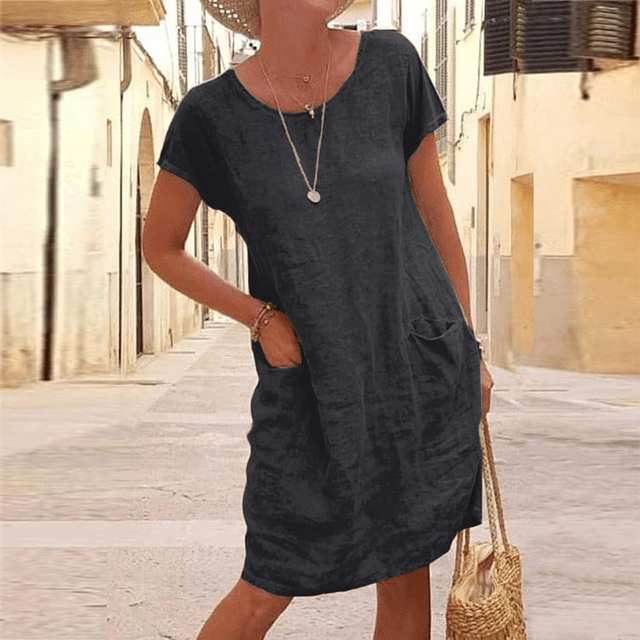 Abito midi donna estivo in cotone leggero con tasche funzionali, perfetto per look casual e comfort estivo.