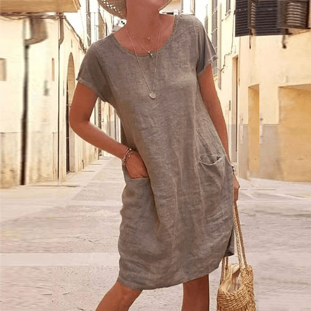 Abito midi donna estivo con tasche per uno stile rilassato e versatile. Ideale per abbigliamento comfort quotidiano.