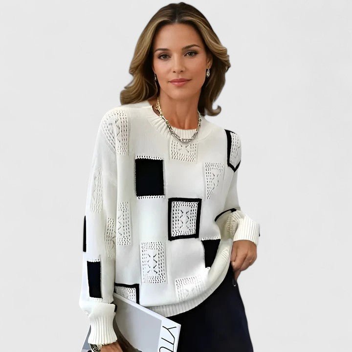 Maglione donna elegante geometrico girocollo con dettagli traforati, perfetto per moda casual.