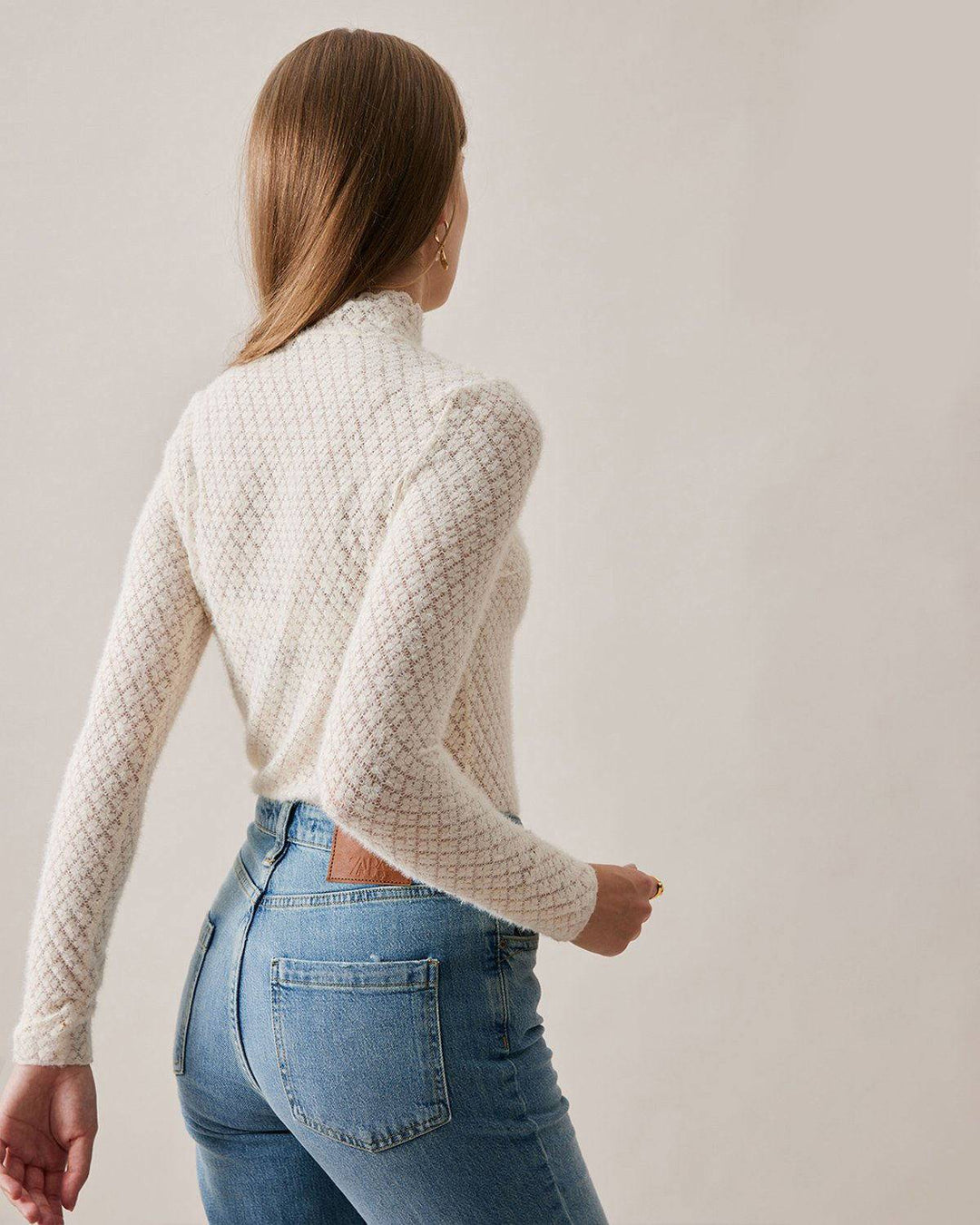 Maglia donna trasparente, collo alto e pizzo, maniche lunghe. Crea outfit casual chic o eleganti.