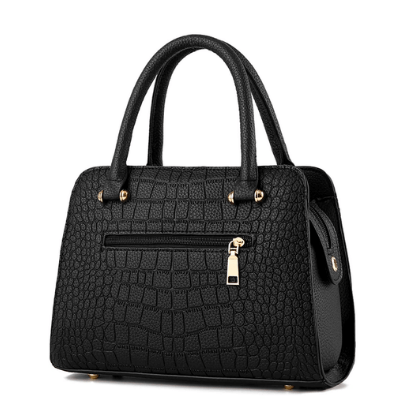 Regalo donna perfetto: borsa a mano effetto coccodrillo, eleganza senza tempo.