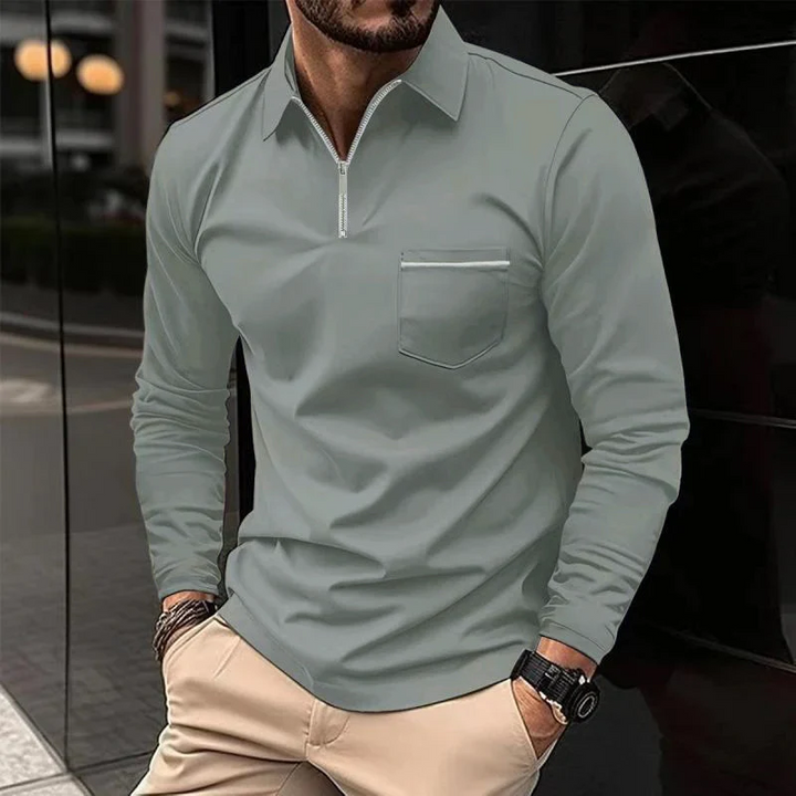 Polo maschile a maniche lunghe con taschino, per un comfort quotidiano e stile moderno.