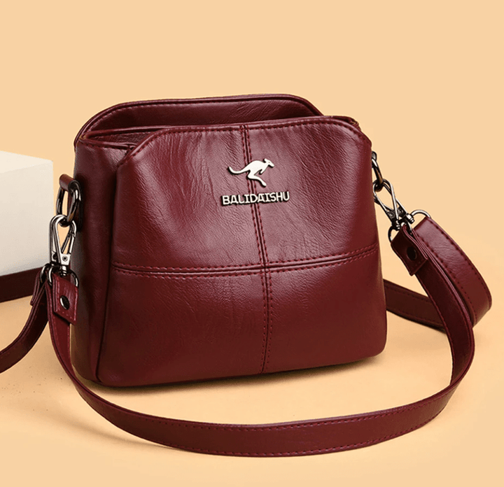 Borsa da donna in pelle classica con tracolla, accessorio moda essenziale.
