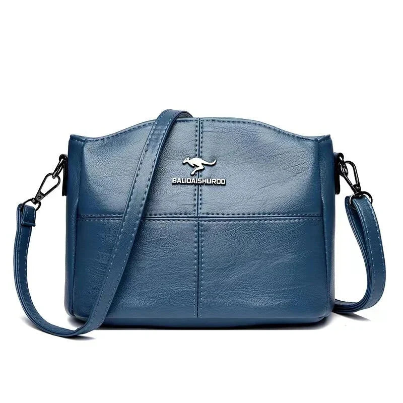 Borsa versatile in pelle beige, comoda e spaziosa per il quotidiano femminile.