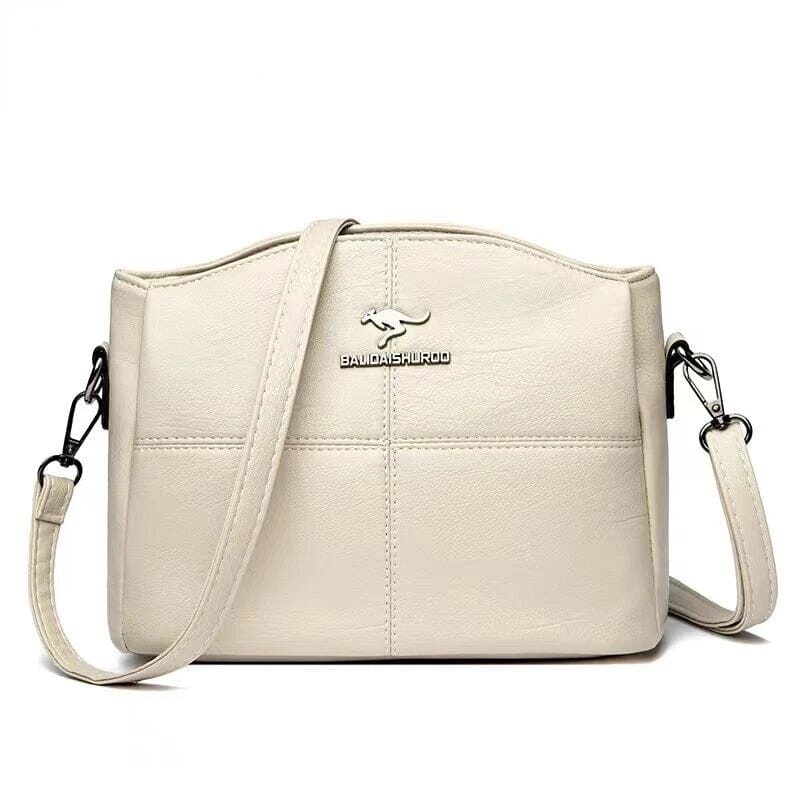 Borsa da donna in pelle, uso quotidiano, tracolla e manici, disponibile in vari colori.