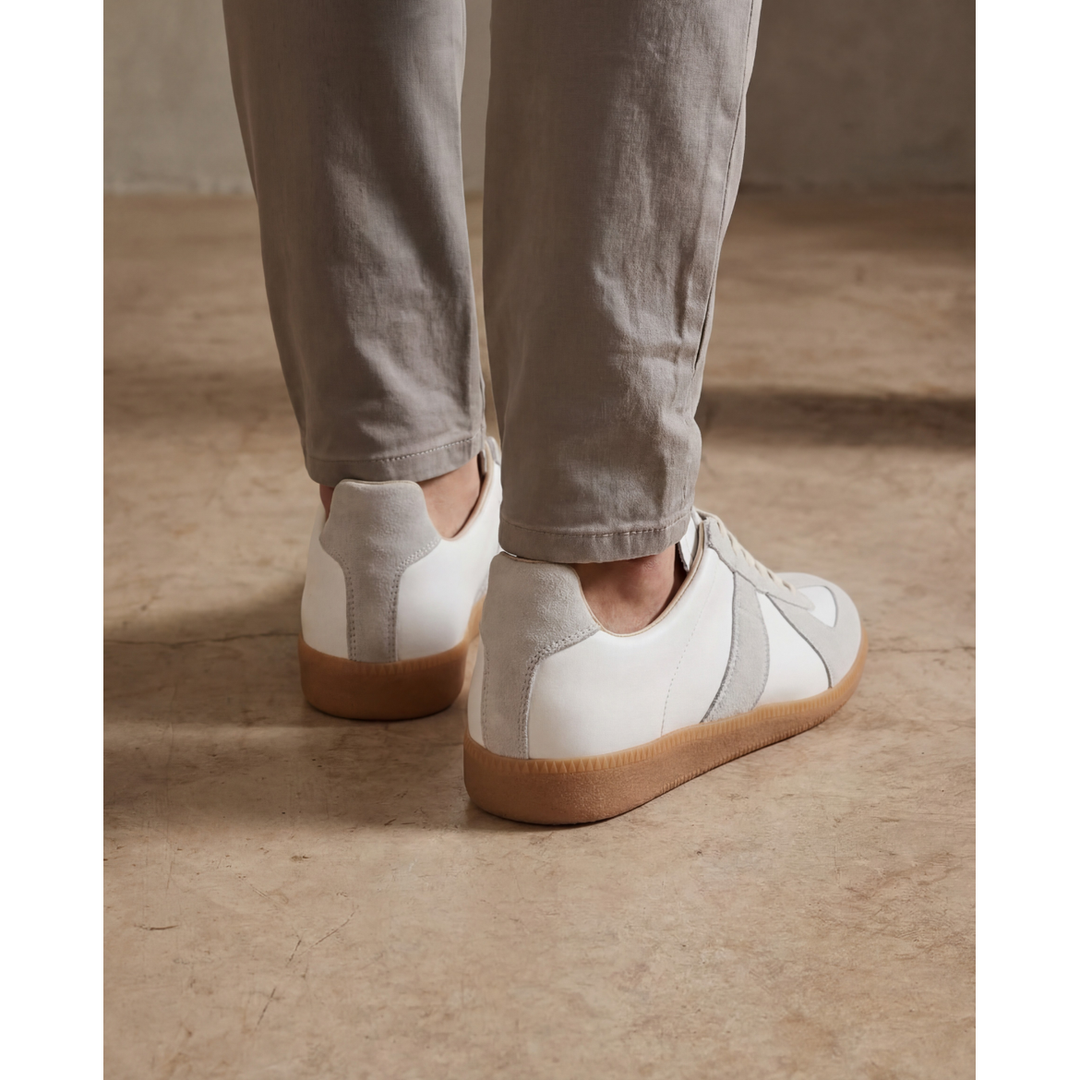 Calzature uomo: sneakers basse casual allacciate. Offrono stile moderno e comfort per ogni giorno.