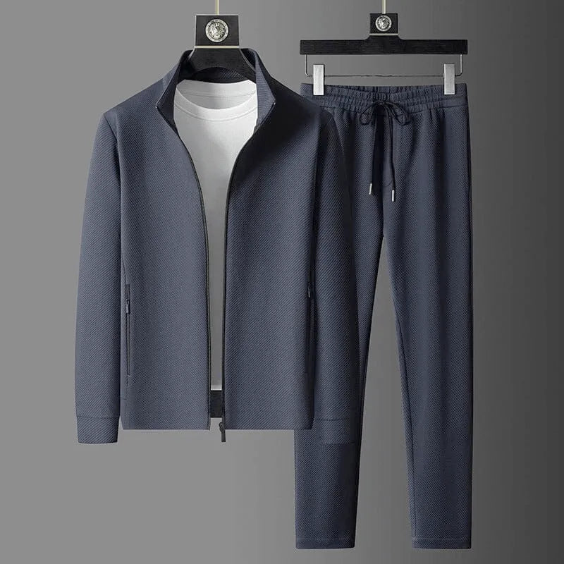 Tuta sportiva uomo premium blu, completo casual per comfort quotidiano e stile athleisure moderno.