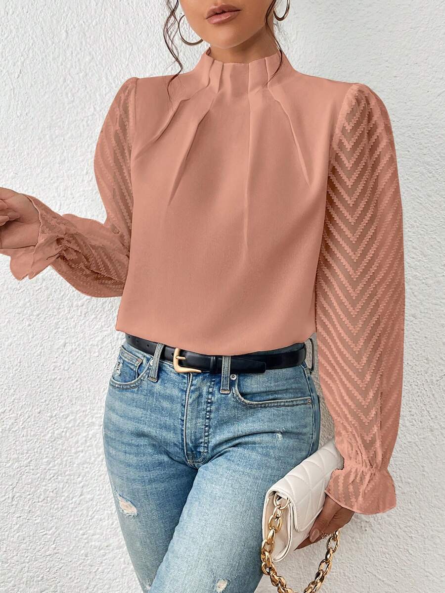Blusa donna primavera-estate, maniche plissettate, taglio svasato elegante. Perfetta per ufficio o tempo libero.