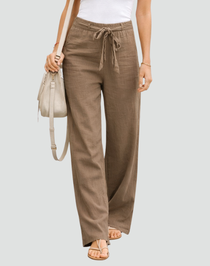 Pantaloni donna in lino a gamba larga, con coulisse in vita, perfetti per look estivi casual e comodi.