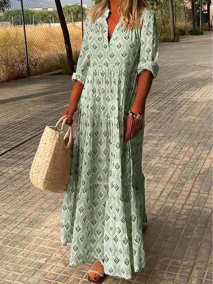 Vestito estivo lungo da donna in stile boho chic, con pizzo e scollo a V. Perfetto per look eleganti e casual.