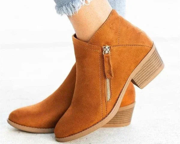 Moda donna: stivaletti casual con cerniera laterale e supporto arco integrato. Stile e comfort.