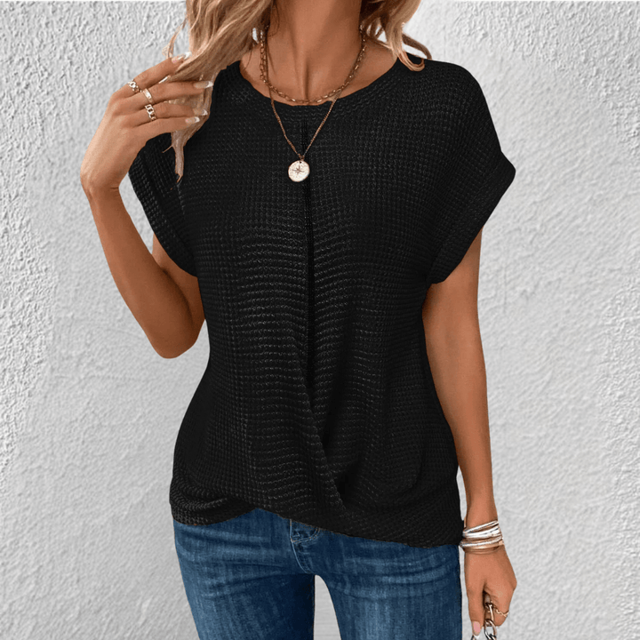 Camicetta donna manica lunga, vestibilità comoda, trama elegante. Perfetta per outfit moda casual.