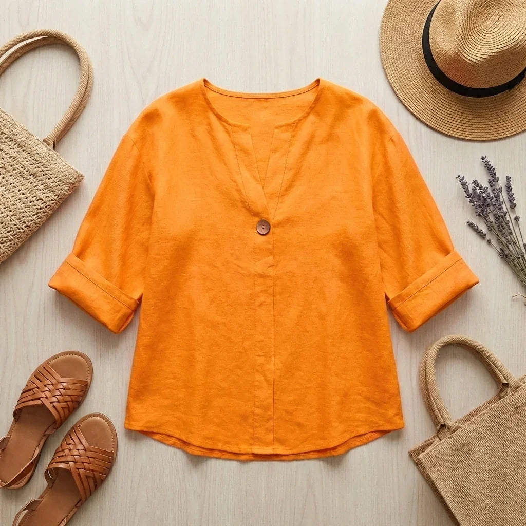 Tunica donna con profondo scollo a V, blusa oversize casual elegante, top leggero per la moda estiva.