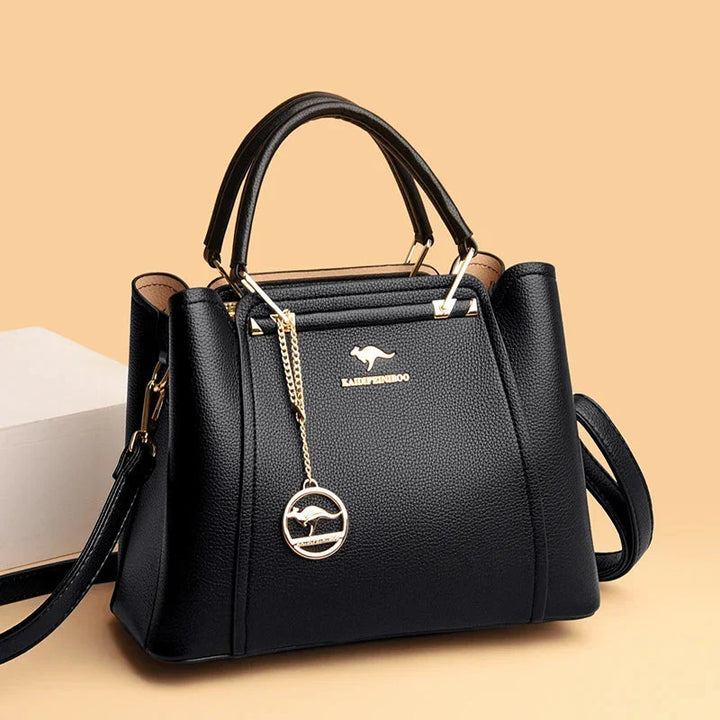 Borsetta da donna in pelle morbida, accessorio moda spalla/tracolla, design elegante.