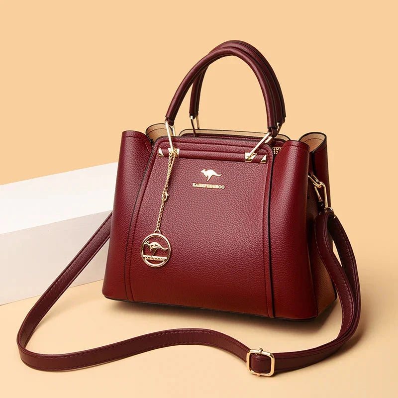 Borsa donna lussuosa, in pelle morbida, con tracolla regolabile e multiscomparto.