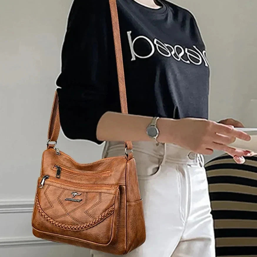 Borsa a tracolla da donna in pelle di lusso. Design versatile per un look casual o elegante.