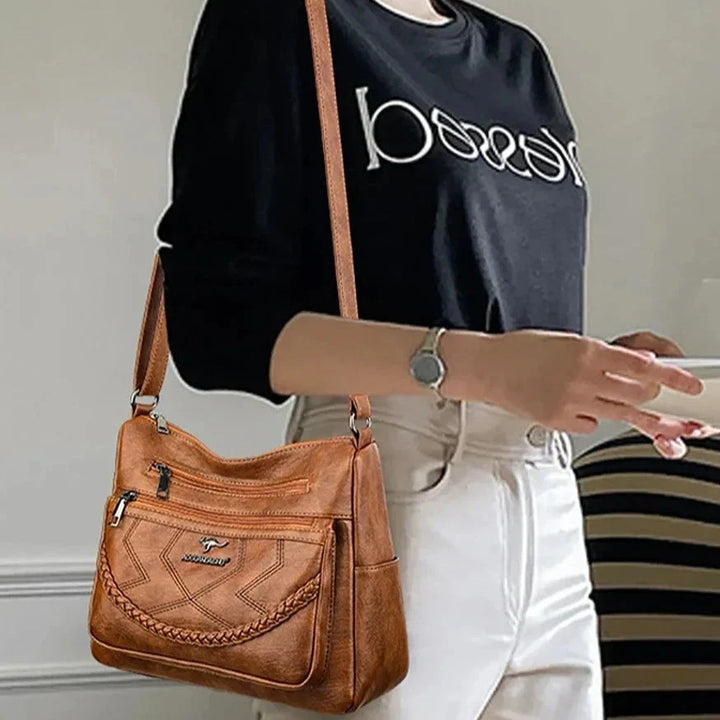 Borsa a tracolla da donna in pelle di lusso. Design versatile per un look casual o elegante.