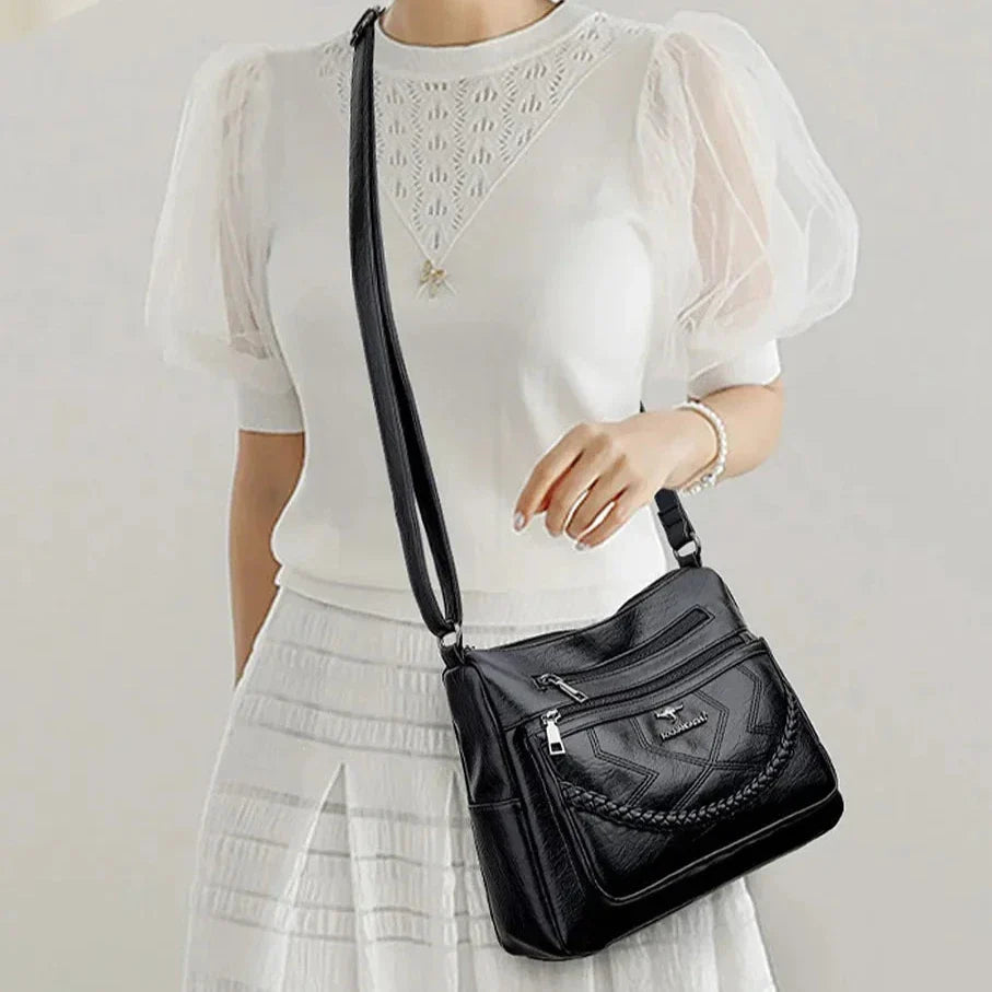 Borsa versatile in pelle morbida da donna. Perfetta come accessorio elegante o casual. Qualità lusso.