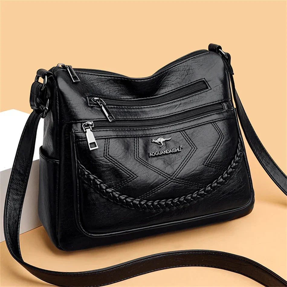 Borsa essenziale da donna in pelle morbida. Qualità lusso e design pulito per ogni outfit.