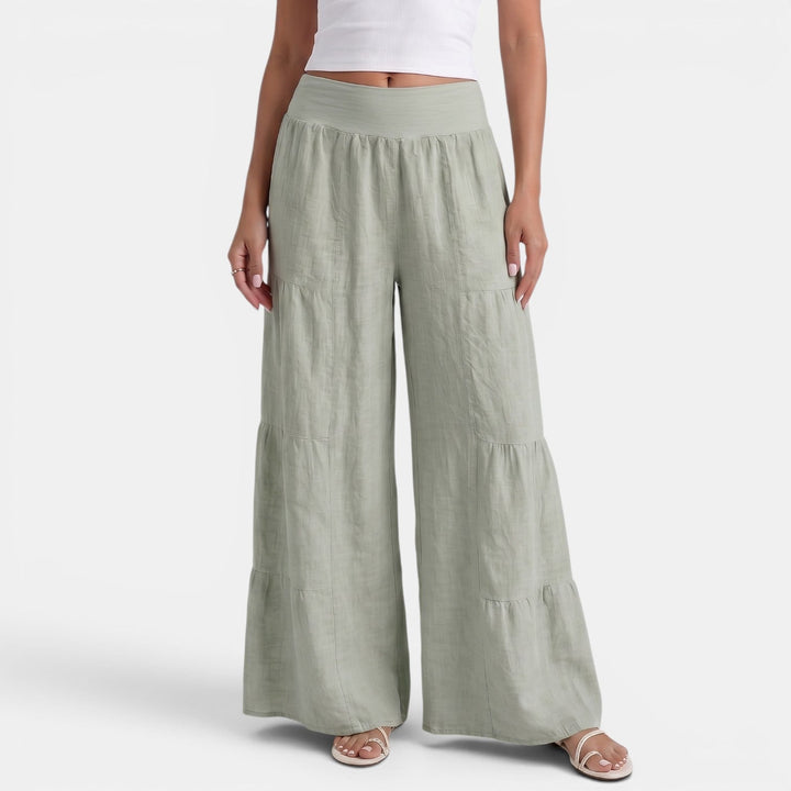 Pantaloni donna ampi in lino color sabbia, taglio fluido estivo, ideali per comfort e stile casual chic.