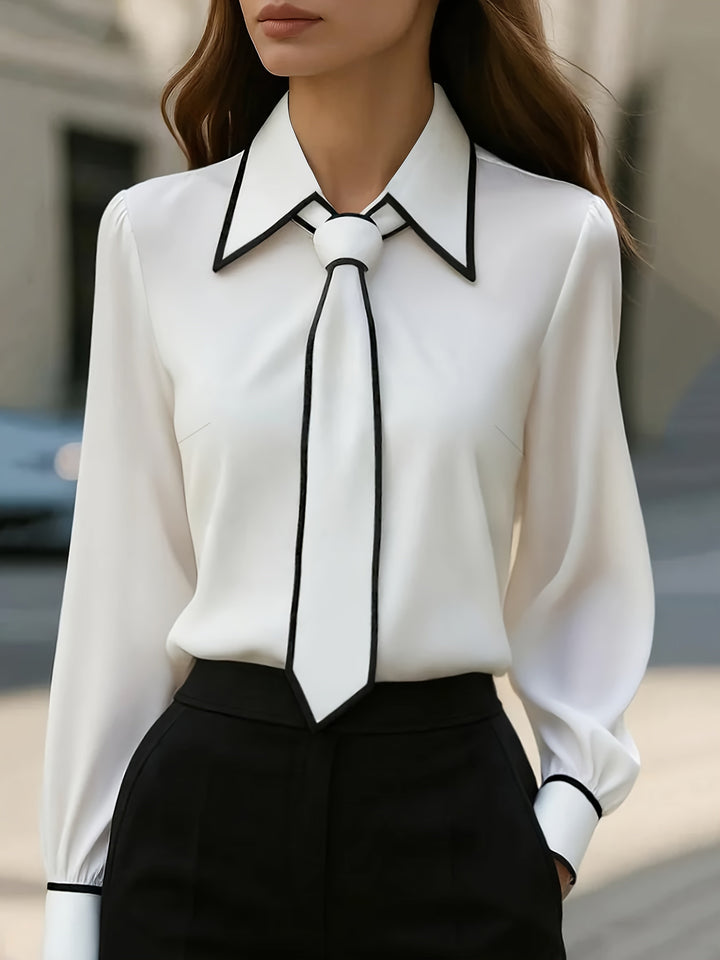 Camicetta donna elegante maniche lunghe con colletto a contrasto e cravatta rimovibile. Perfetta per ufficio o casual chic.